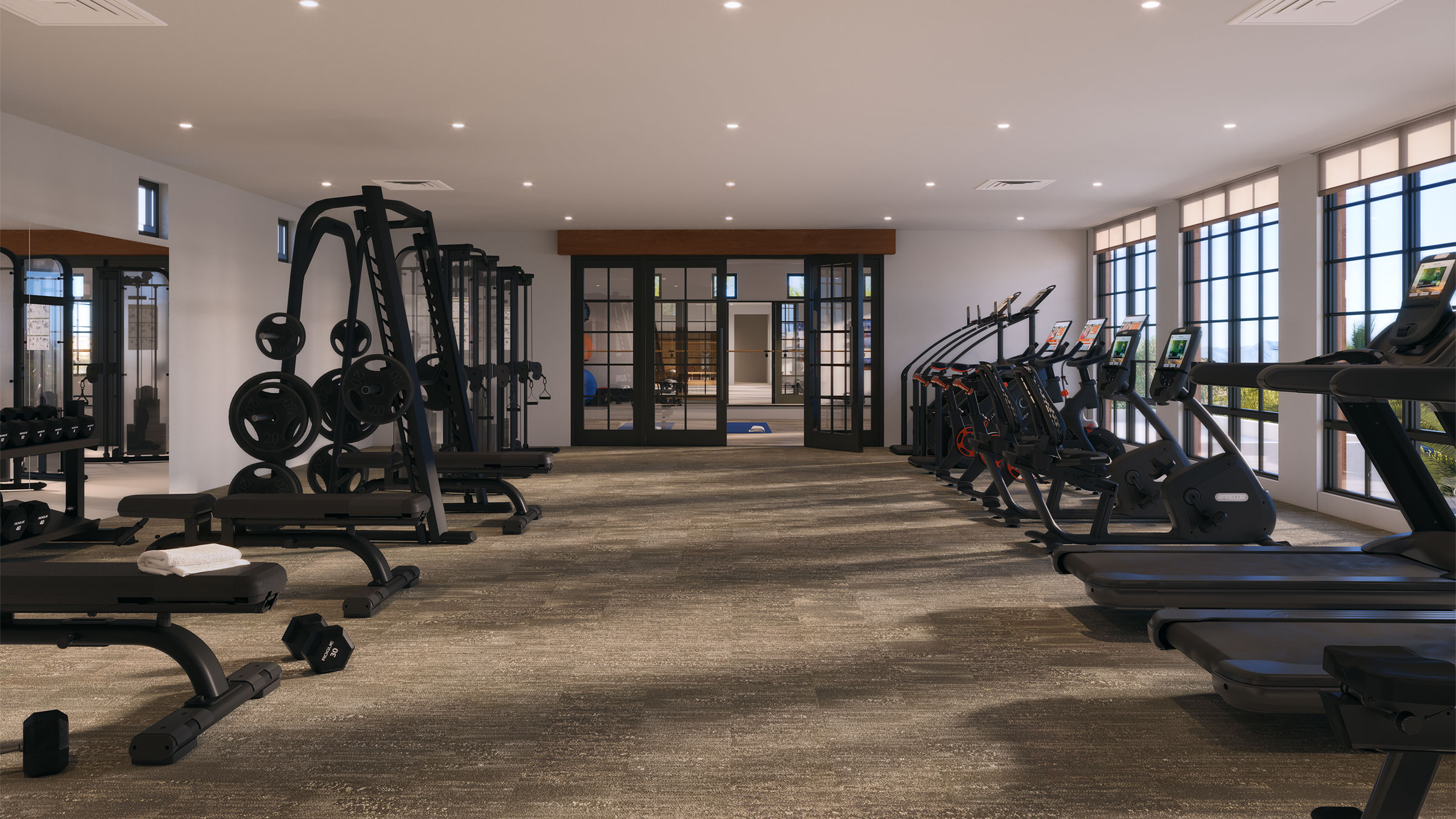 The fitness room offers state-of-the-art equipment and stunning views.